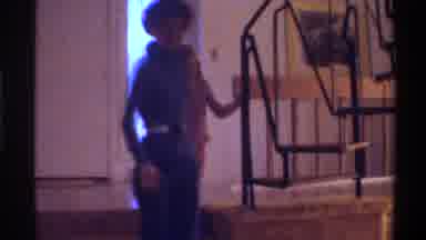 Gainsville Florida USA (1975): Very Thin Woman Leads Child Down Stairs By Hand To