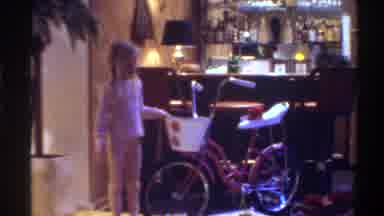 Gainsville Florida USA (1975): Tween Girl Pink Pajamas Receiving Bike With Banana