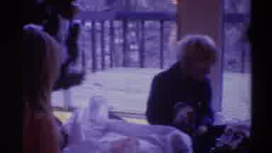 Gainsville Florida USA (1975): Family Happily Opening Christmas Gifts On The Floor
