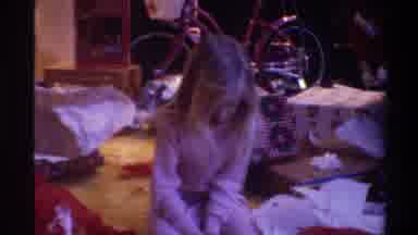 Gainsville Florida USA (1975): Child In The Star Room Opening Presents Very Eager