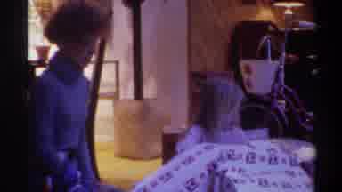 Gainsville Florida USA (1975): The Lady And The Girl Are Sitting On The Floor The