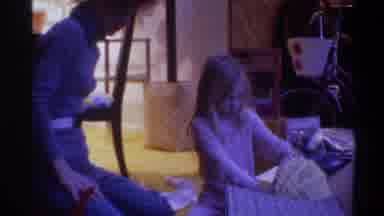 Gainsville Florida USA (1975): Kid Helping More Put Together Basket
