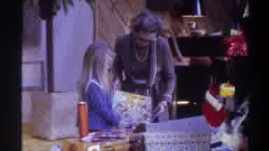 Gainsville Florida USA (1975): An Old Lady Giving A Young Girl Two Gifts In The