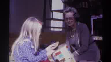 Gainsville Florida USA (1975): A Well Dressed Mature Woman Sitting On The Floor