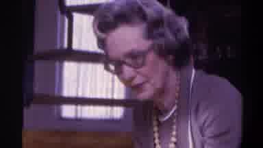 Gainsville Florida USA (1975): A Well Dressed Mature Woman Talks To A Blonde Girl