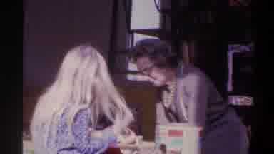 Gainsville Florida USA (1975): Grandmother Sitting On The Floor Playing With Toys