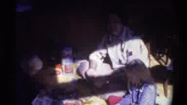 Gainsville Florida USA (1975): Three Humans Sitting Down Cross Legged On The