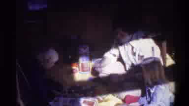 Gainsville Florida USA (1975): Dad And His Son And Daughter Unwrapping Presents