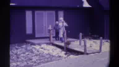 Gainsville Florida USA-1975: Woman And Two Children Walking Across Footbridge