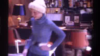 Gainsville Florida USA (1975): A Woman In Blue Clothes And Christmas Hat Crosses