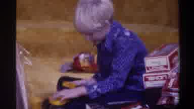 Gainsville Florida USA (1975): Smart Boy Playing With His Toy In Home To Prove His