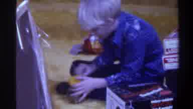 Gainsville Florida USA (1975): Boy Playing With His Toys On The Floor