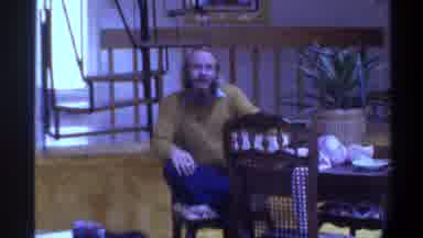 Gainsville Florida USA (1975): Man Has Uncomfortable Conversation In Dining Room