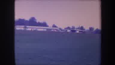 Volmer Yucaipa California USA (1959): View Of Airplane Landing In Grassy Field On