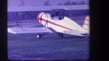 VOLMER YUCAIPA CALIFORNIA USA-1959: Vintage Biplane on Grass Airfield