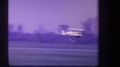 Volmer Yucaipa California USA (1959): A Small Prop Plane Landing In A Runway Area