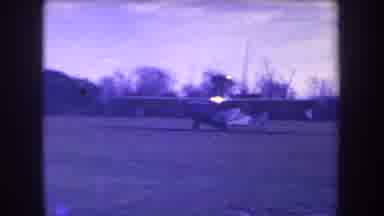 Volmer Yucaipa California USA-1963: Amphibious Plane Moving Across Open Field