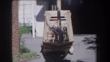 Volmer Yucaipa California USA (1965): Boat Being Built Of Wood Near A Garage House