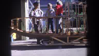 Volmer Yucaipa California USA (1965): Two Small Children Playing On A Boat Frame