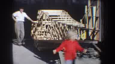 Volmer Yucaipa California USA-1965: Man Stands Next To Home Built Wooden Airplane Model