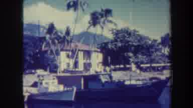 Honolulu Hawaii USA (1967): Man Sitting In A Tropical Marina With Boats And