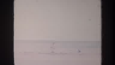 Honolulu Hawaii USA (1967): People Playing With The Water In The Beach And