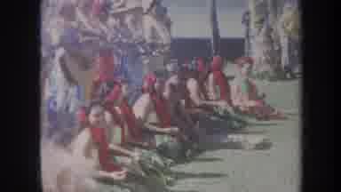 Honolulu Hawaii USA (1967): Natives Performing A Ritual For Tourists While Sitting