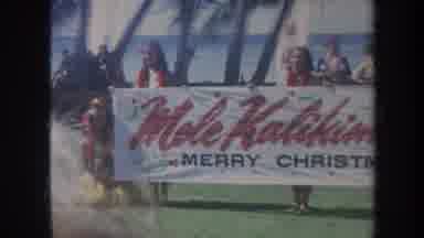 Honolulu Hawaii USA (1967): HONOLULU HAWAIIan Women In Grass Skirts Holding Banner