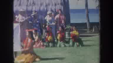 Honolulu Hawaii USA (1967): Small Group Of People Holding Up A Christmas Banner