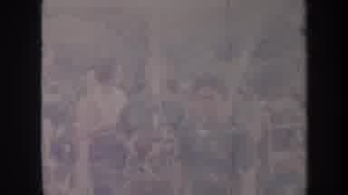 Honolulu Hawaii USA (1967): People Talking Walking Past Pink Flowers At Outdoor