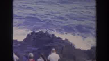 Honolulu Hawaii USA (1967): People Watch Water Waves Violently Hit Rocks Warning