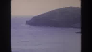 Honolulu Hawaii USA (1967): Incoming Waves Splash Onto A Cold Snowy And Sandy