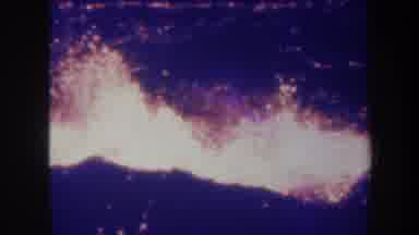 Honolulu Hawaii USA (1967): Molten Hot Red Lava Bursting High From A Black Volcano