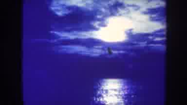 Honolulu Hawaii USA (1967): Rolling Clouds Waves Tiki Torches Blowing Fire