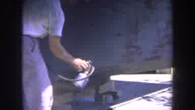 Volmer Yucaipa California USA (1969): Man Spray Painting A Metal Surface In An