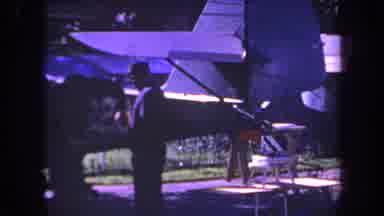 Volmer Yucaipa California USA (1969): Two Men Pointing And Talking In Front Of Old