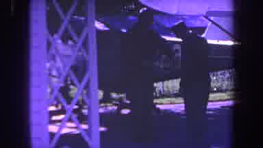 Volmer Yucaipa California USA (1969): Two Men Talking While Standing Besides A