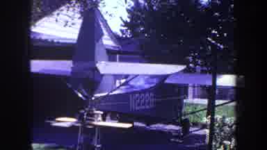 Volmer Yucaipa California USA (1969): An Old Small Airplane Sitting In A Driveway