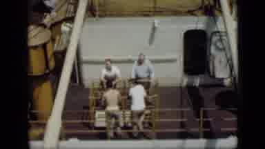 Cairo Egypt (1946): Four People Meet To Talk On A Boat While Wearing White