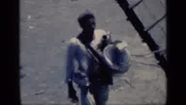 Cairo Egypt (1946): First A Young Man Carrying An Object While Walking Across The