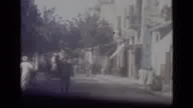 Cairo Egypt (1946): People Walking Around Outdoor Shopping Area On Bright Sunny