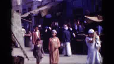 Cairo Egypt (1946): People Walking Around Outdoor Shopping Area On Bright Sunny