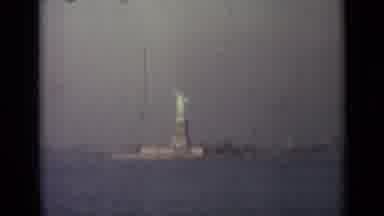 London England (1946): Riding Across Bay Past Statue Of Liberty With City In