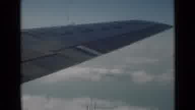 London England (1946): View Of The Wing Of An Airplane Slowly Moving Forward