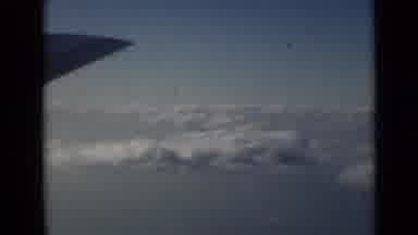 London England (1946): Clouds From Above In A Airplane Out Of Window Seat View