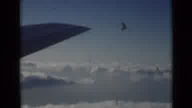 London England (1946): Two Scenes One With A Airplane Wing In Clouds And View Of