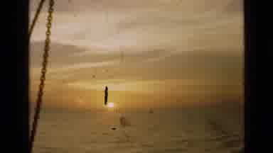 London England (1946): Beautiful Orange Sunset With A Blue Sea And Some Clouds To