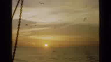 London England (1946): Sunset On A Beach Followed By A Group Of Military Man