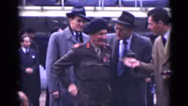 London England (1946): An Army Official Accompanied By Subordinates Walking Down