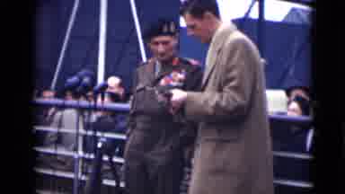 London England (1946): Veteran Man Receives Award At A Ceremony Presided Over By A